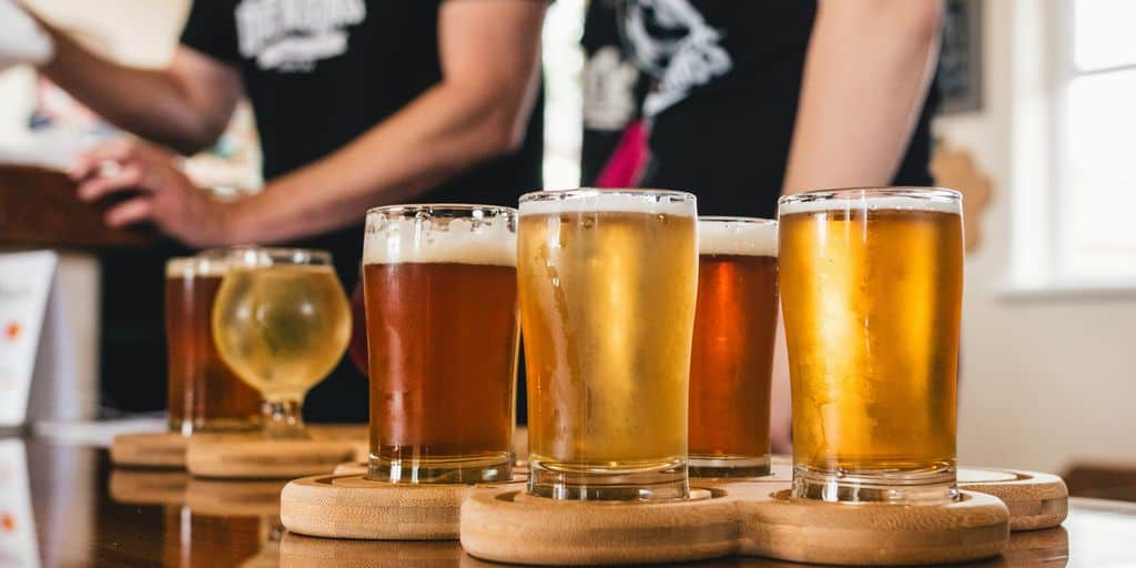 clear drinking glass with beer