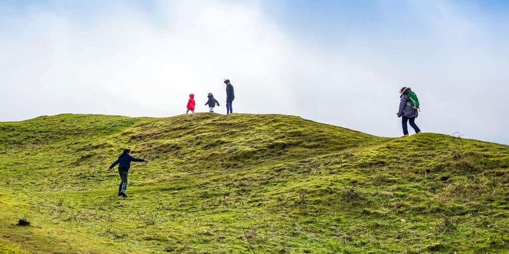 several people on mountain top
