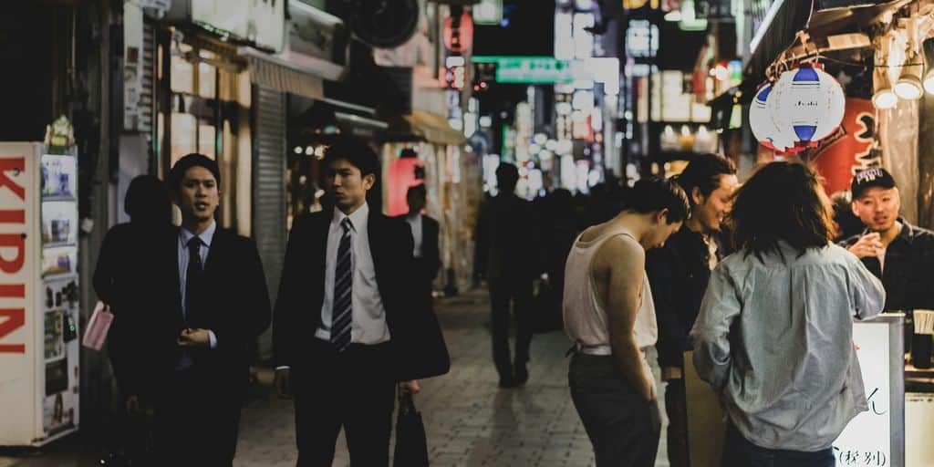 people on street during night